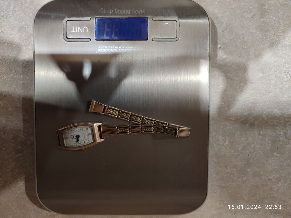 Золотые женские часы Заря и Звезда