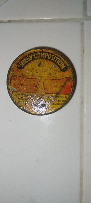 Antique metal box with divider for sharpening stones