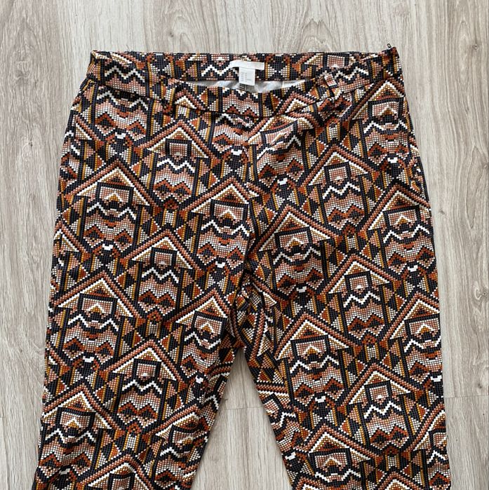 Wzorzyste spodnie H&M aztecki wzór brąz pomarańcz 42 xl jak nowe