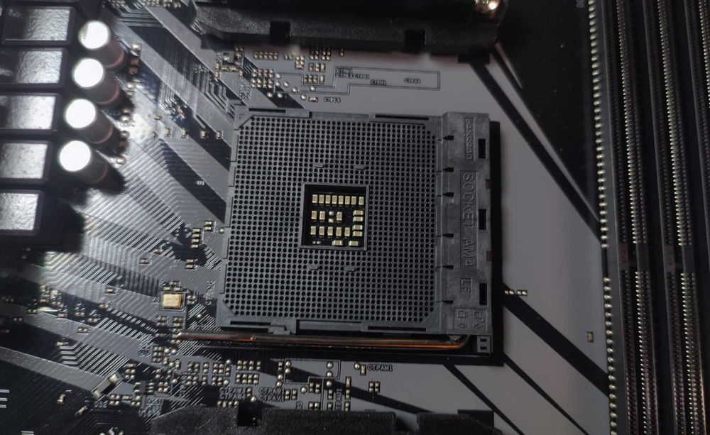 Материнська плата  ASRock B450M PRO4 (AM4)