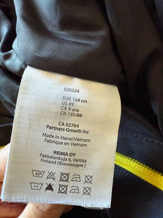 Puchowy kombinezon Reima - 134 cm