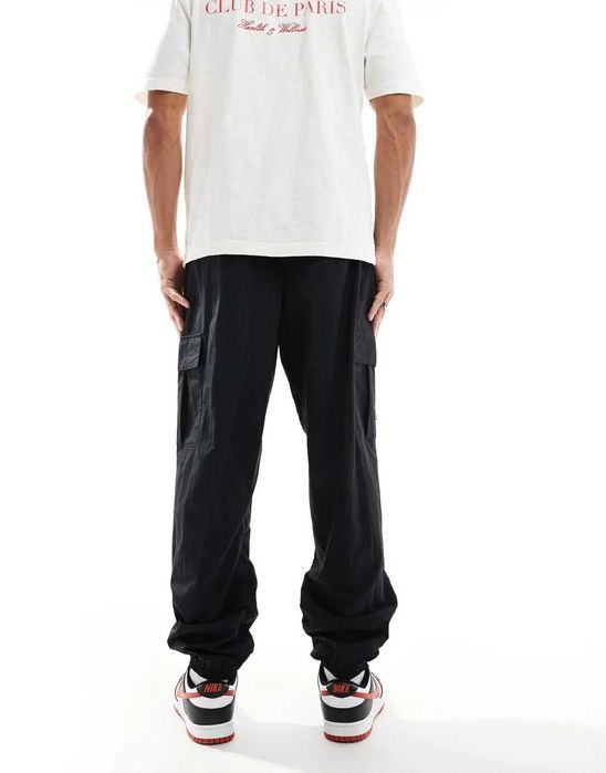 Новые штаны-карго nike (найк club woven cargo trousers) европы m,l