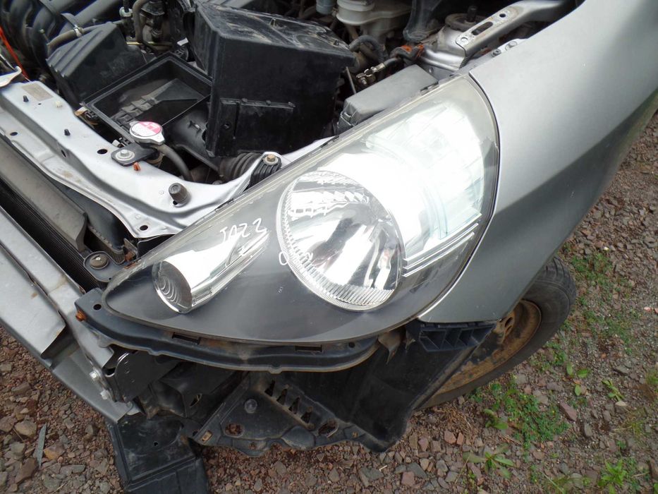 Sie6 Lampa przednia lewa honda jazz lift 05r EU wysyłka