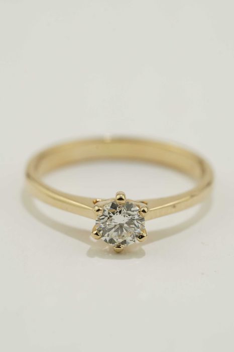 Złoty pierścionek z brylantem 14k 1,64g