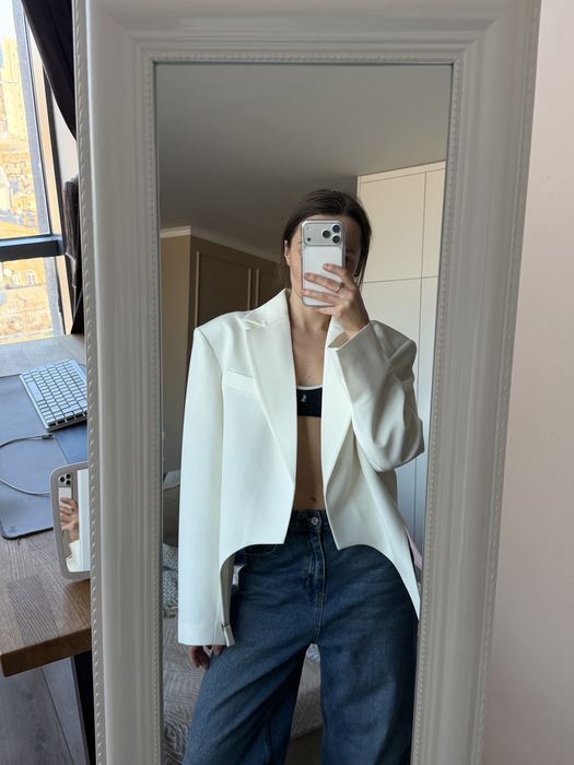 Жакет Bazhane с гартерами молочний