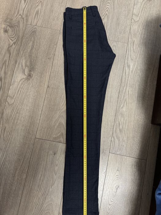 Чоловічі брюки в клітинку