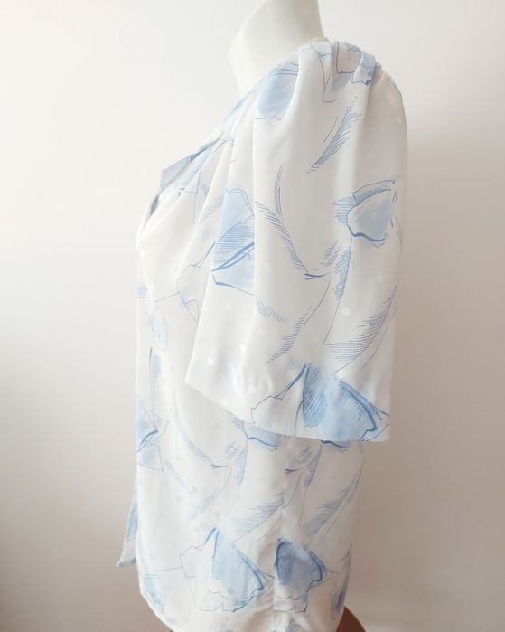 Blusa acetinada estampada