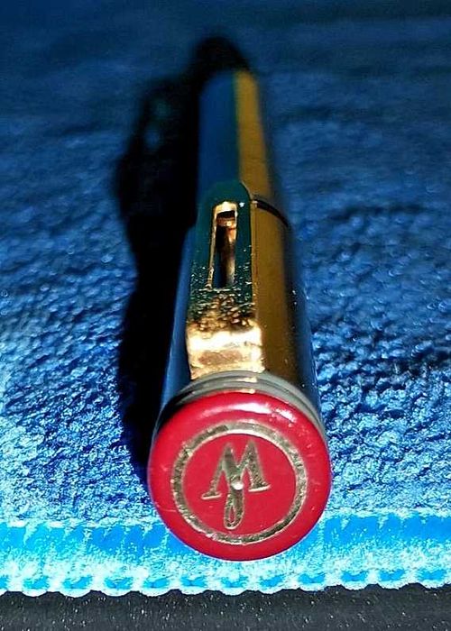Caneta-tinteiro Waterman cromada, fabricada em França.