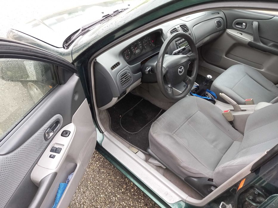 mazda 323 f bom e barato