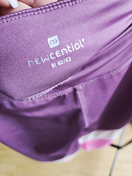 Legginsy sportowe z kolorowymi panelami i siateczką Newcential rozm M