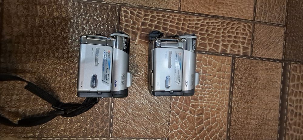 Відеокамера Panasonic NV-GS55,фотоапарат  olimpus