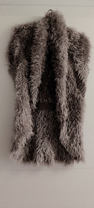 Colete de pelo sem botões . Usado