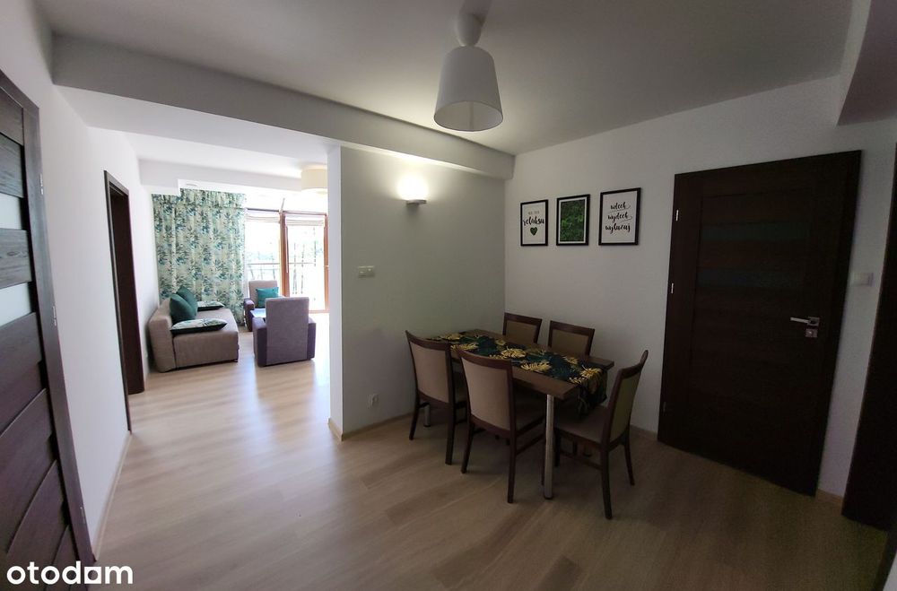 Przestronny apartament z balkonem i windą nad jeziorem Pluszne