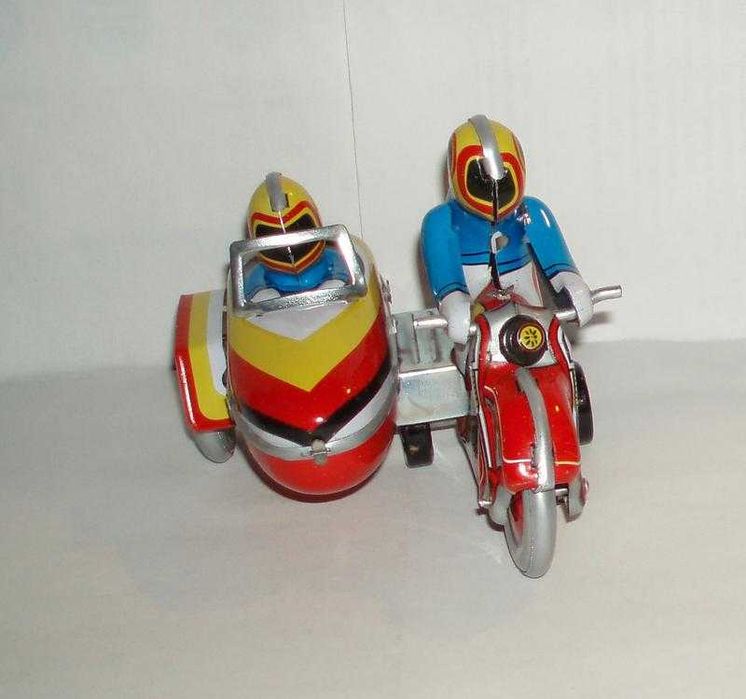 Новая коллекционная заводная игрушка мотоциклист ретро стиль жесть