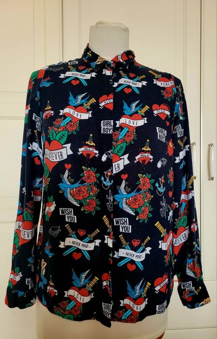 Koszula we wzory  tattoo serca, róże..
Mohito roz 34
Dobra od xs do m