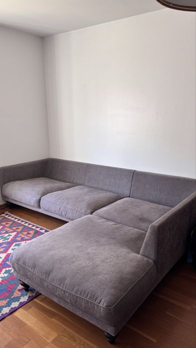 Sofá de canto cor cinzenta