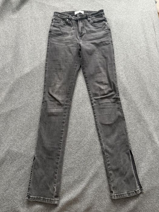 Джинсы клеш внизу с розрезами