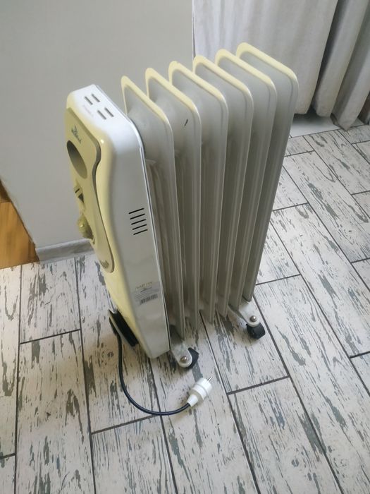 Масляний обігрівач.