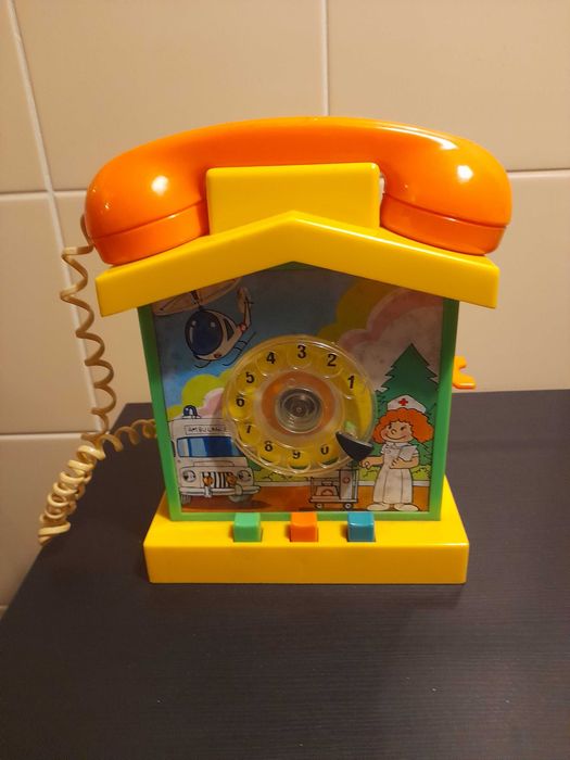 Brinquedo antigo telefone mealheiro