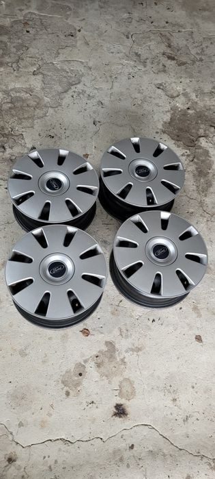 Felgi+oryginalne kołpaki Mondeo mk5 R16