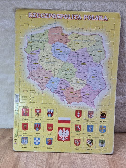 Puzzle mapa Polski z herbami miast