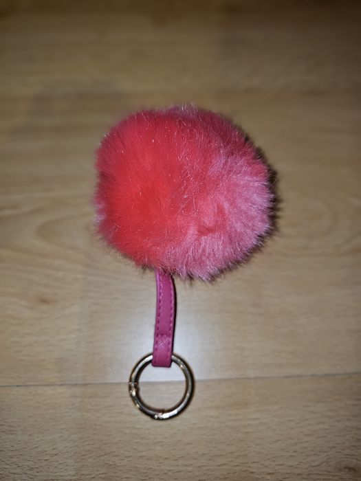 Porta chaves ou para pendurar nas mochilas