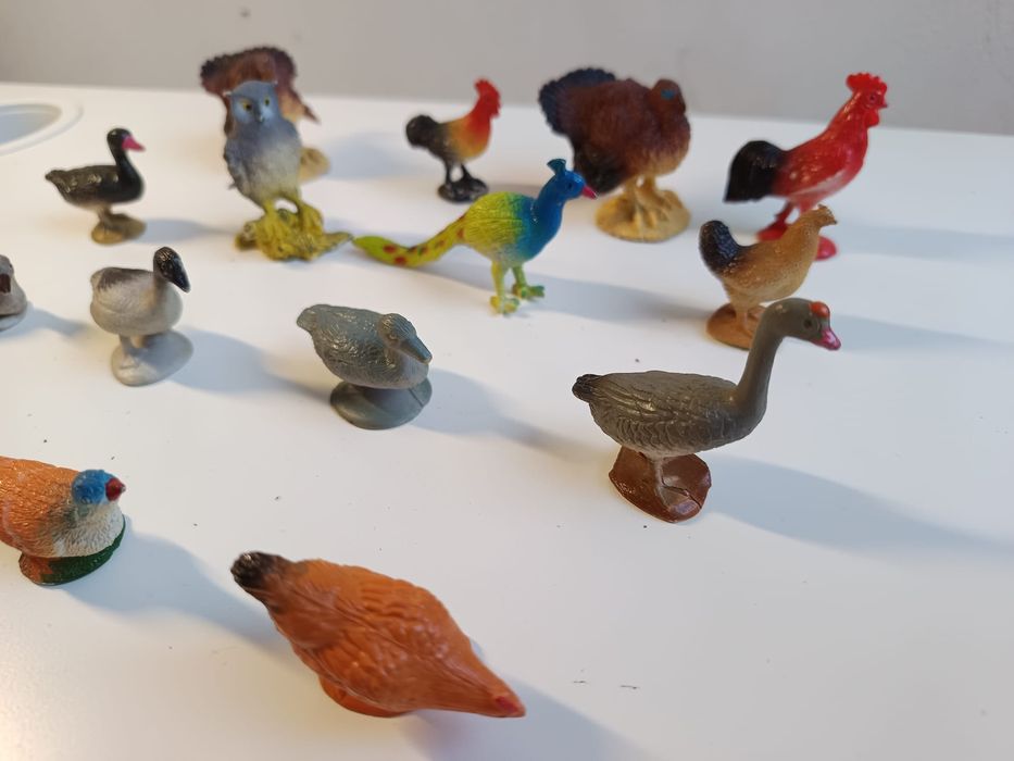 15 bonecos em PVC aves