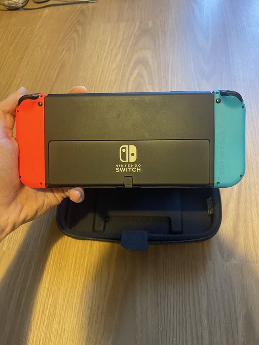 Nintendo Switch OLED com bolsa de transporte + 2 películas