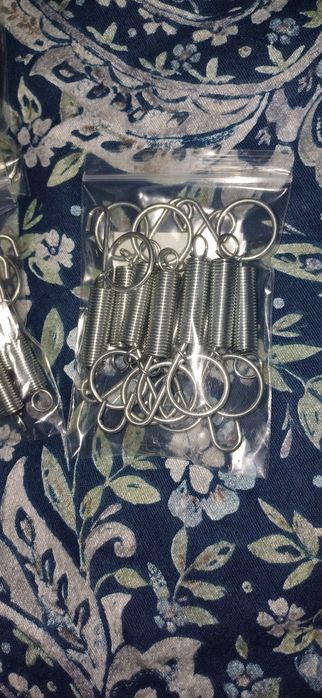 Molas   em  inox  para  gaiolas