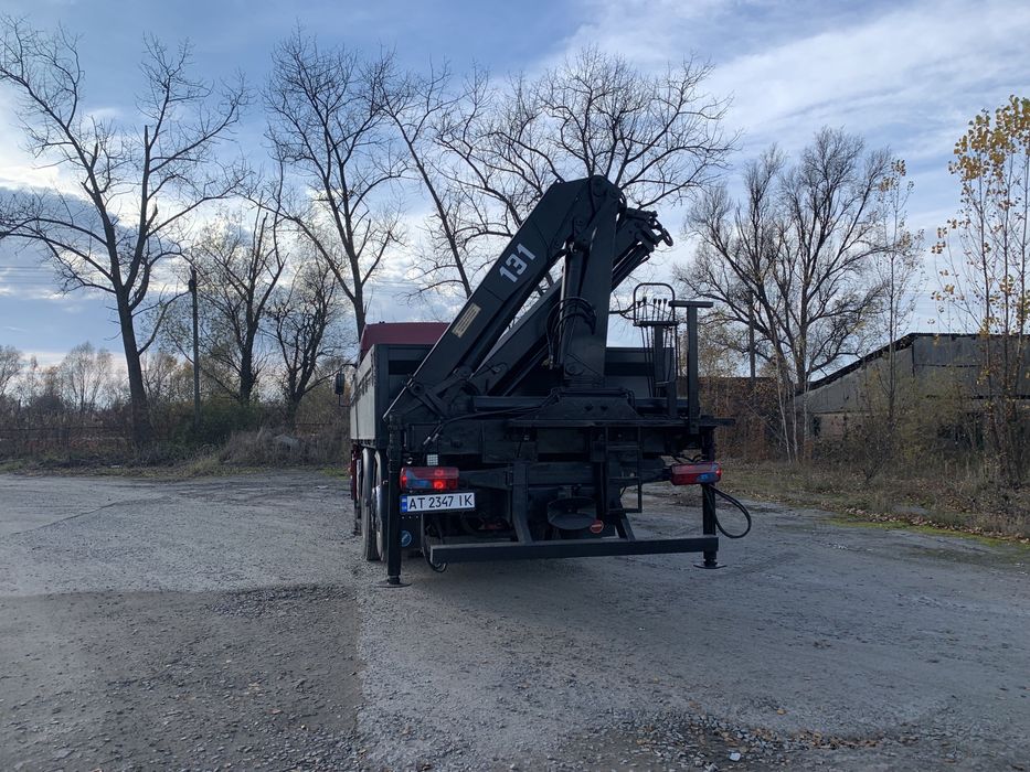 Ман самоскид з маніпулятором