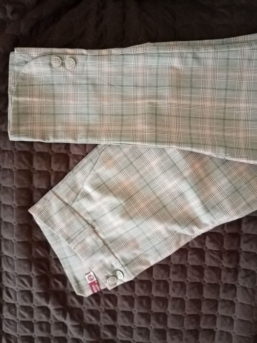 Calça de xadrex de meia estação