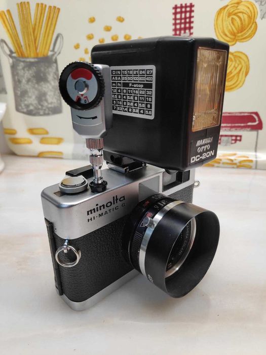 Máquina fotográfica Minolta Hi-Matic G c/ Extras
