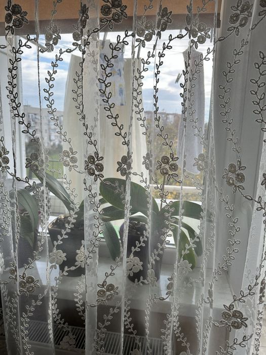 Тюль на велике вікно з балконом