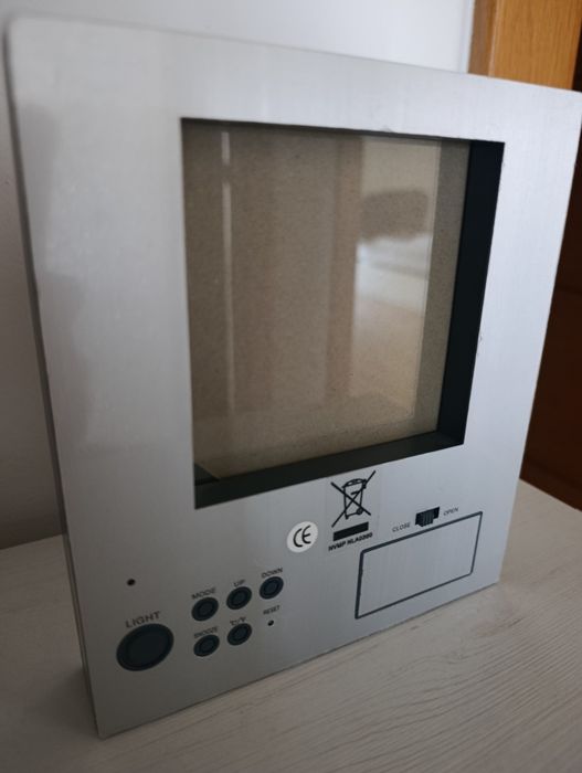 Frame with light and display of date, time, and indoor temperature64751277718019122