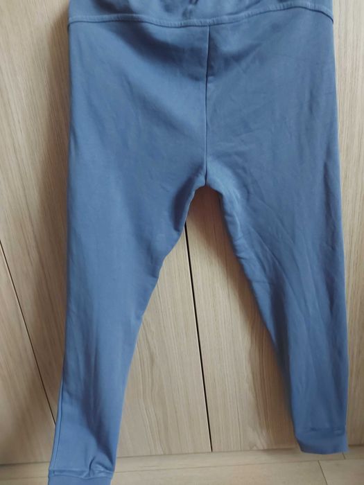 Spodnie dresowe joggery 164cm błekitno-szare
