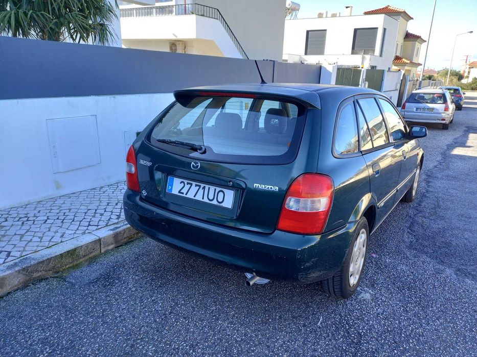 mazda 323 f bom e barato