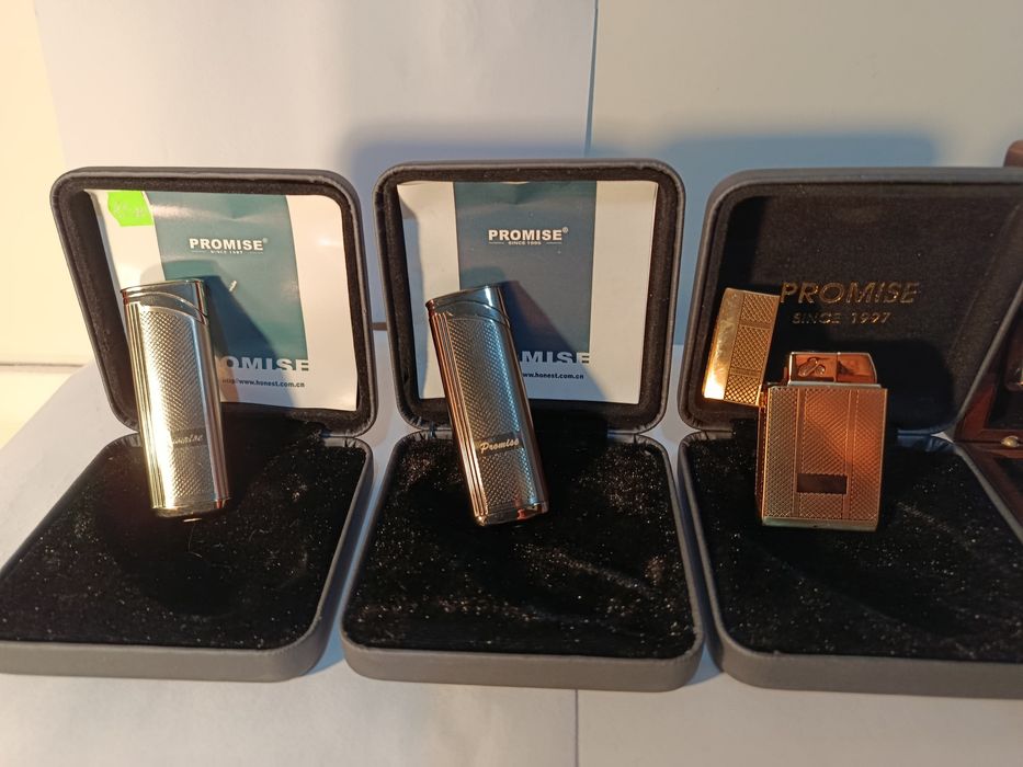 Запальничка зажигалка  Promise 300 грн