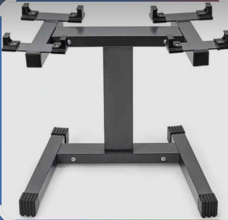 suporte de halteres ajustáveis da marca Currency.Estrutura A-Frame: O design em forma de "A"