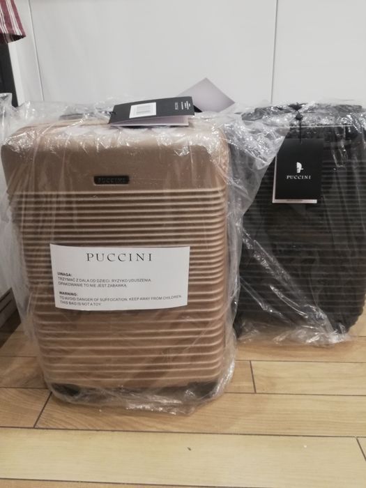 Nowa walizka kabinowa Puccini czarna lub złota