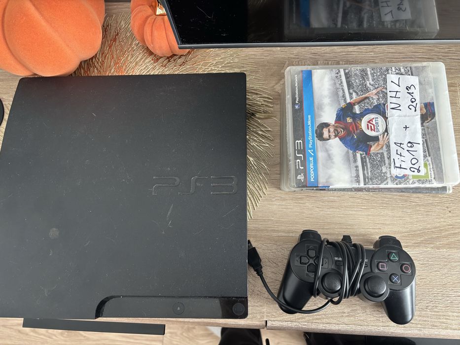 PS3 + pad przewodowy i gry