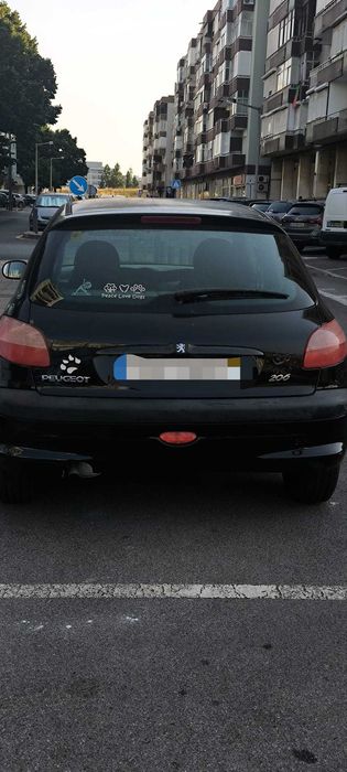 PEUGEOT 206, preto, citadino versátil para iniciantes — photo 2