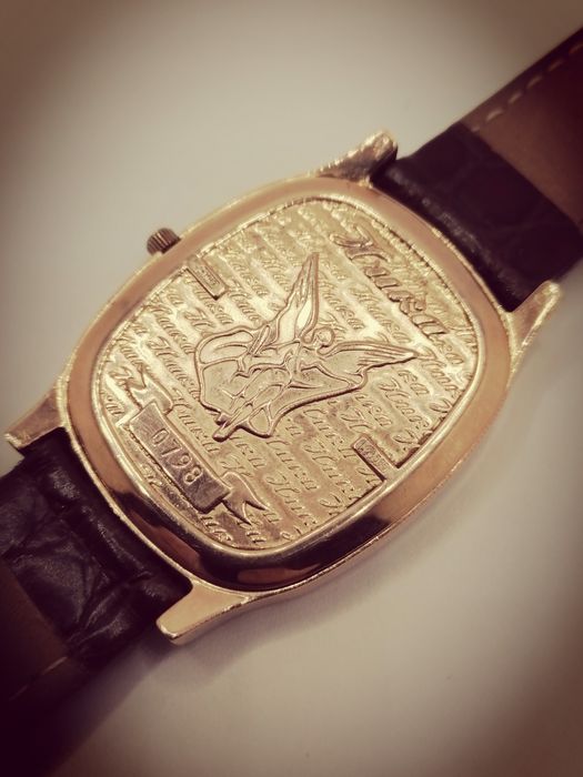 Золотые часы Ника