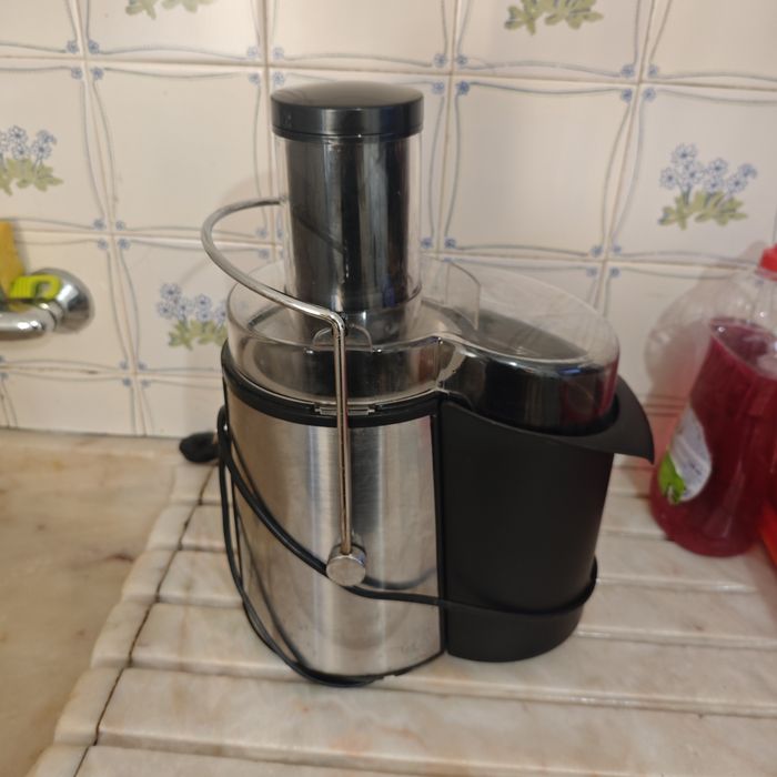 Triturador com depósito