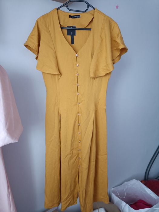 Reserved rozmiar 36 S musztardowa sukienka midi na wiosnę na lato