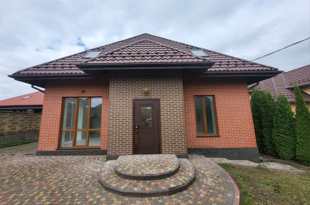 Продам  Новий будинок з ремонтом + ділянка 8 сот