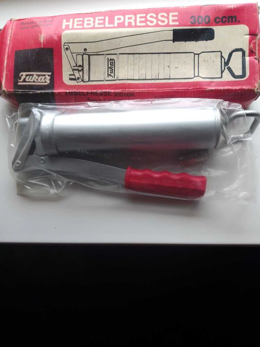 Інструмент шприц важильно-плунжерний.