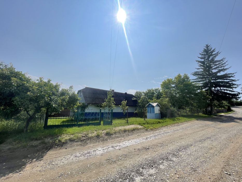 Будинок з приватизованою земельною ділянкою