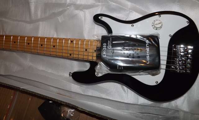 Guitarra elétrica para criança