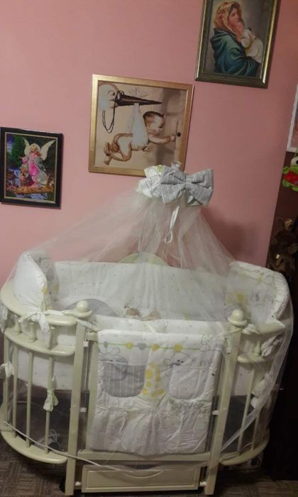 "Кароліна" Дитяче ліжечко-трансформер(кругле/овальне)з ящиком кроватка