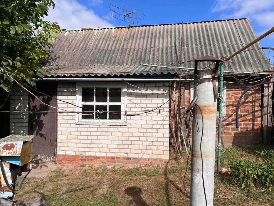 Продам 1/2 будинка в м.Богодухові